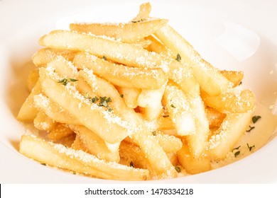 Parmesan Truffle Fries In A White Plate