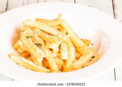 Parmesan Truffle Fries In A White Plate