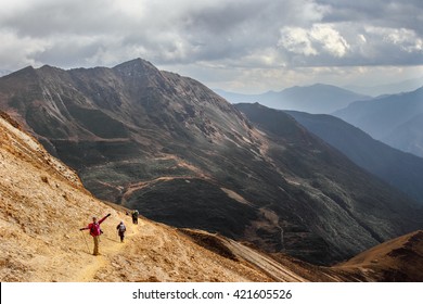 PARO, BHUTAN - Circa October 2012: Hikers In The Mountains Of Bhutan