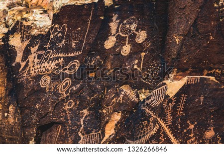 The Parowan Gap Petroglyphs, a collection of ancient rock art by Archaic, Fremont, and Paiute native americans near Parowan and Paragonah, Utah, United States.