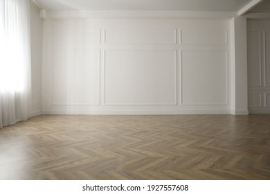 Parquet floor in light spacious empty room - Shutterstock ID 1927557608