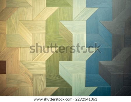 Parquet patchwork for demonstration therefore symmetrical woods of different colours. Perfect to use as a background