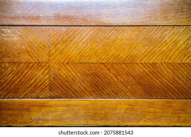 parquet from red wood varnished, fragment, blurred image 