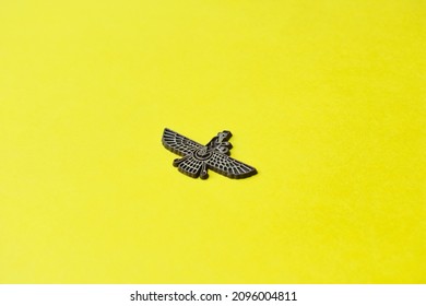 Parsi Holy Symbol Badge With Yellow Background. Zoroastrian Symbol.