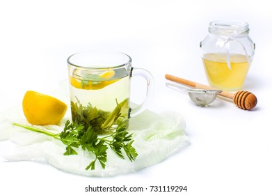 Parsley Tea With Lemon And Honey On White