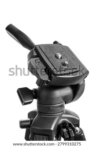Part of adjustable prof camera tripod closeup isolated on white background