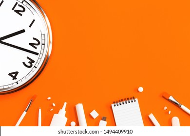 Part of analogue plain wall clock on trendy orange background with white stationery items. One o'clock. Close up with copy space, time management or fall school concept and opening hours time