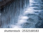 Part of the beautiful and big water fountain. Background with flowing water.