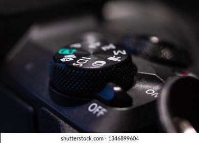 Part of black digital mirrorless camera. Macro close-up shot.