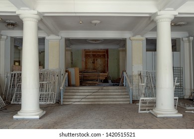 Part of a building with columns. Elements of the building. The facade of the building in the historic style.