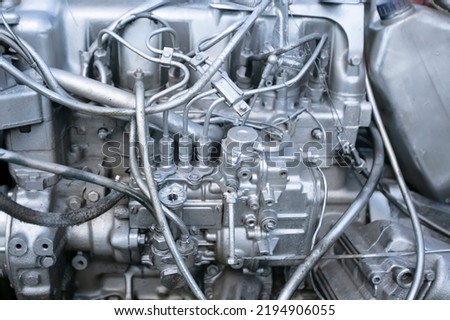 Similar – Truck Engine Motor Components In Car Service Inspection