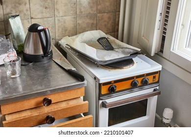 Part Of A Dirty, Messy Kitchen With Stove