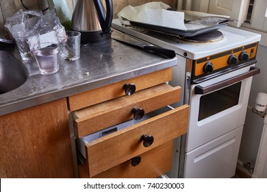 Part Of A Dirty, Messy Kitchen With Stove