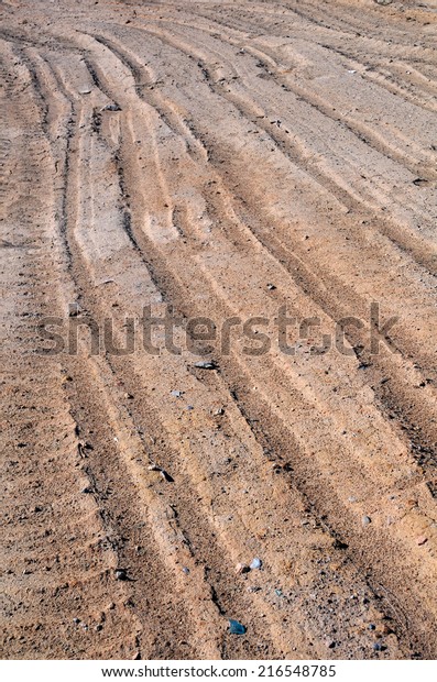 Part of dry dirt road in\
Kazakhstan