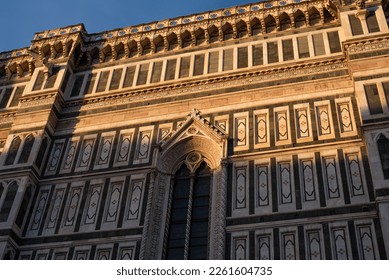 Part of the facade of an ancient building Duomo in Florence, sunset, close up. - Powered by Shutterstock