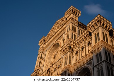 Part of the facade of an ancient building Duomo in Florence, sunset, close up. - Powered by Shutterstock