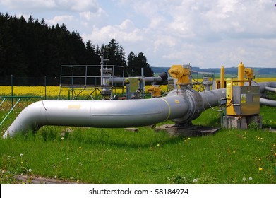 Part Of Gas Pipeline Control Station In The Middle Of Fields. Big Inlet Knee In Front.