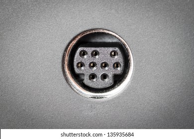 Part of guitar amplifier panel, input jack, close up.