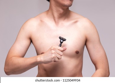 Part of human chest hair going to be shaved and removed by razor - men's grooming and cleanliness concept - Powered by Shutterstock