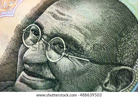 part of the Indian paper money - a portrait of Mahatma Gandhi