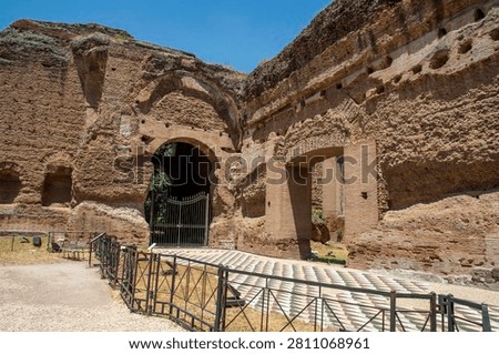 Part of the internal section with massive ancient brick walls and arches of the Baths of Caracalla in Rome, Italy, Ialy