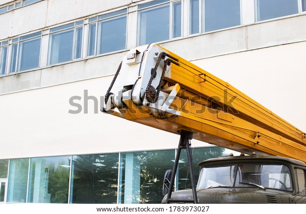 Part of large car\
with construction crane