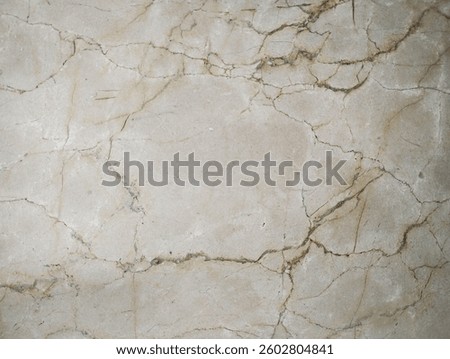 Part of a light marble with brownish tortuous lines for background