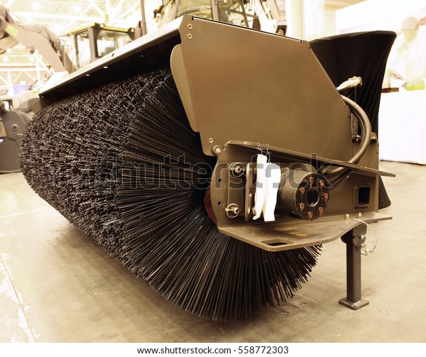 Part of municipal car  for cleaning roads and\
sidewalks, closeup