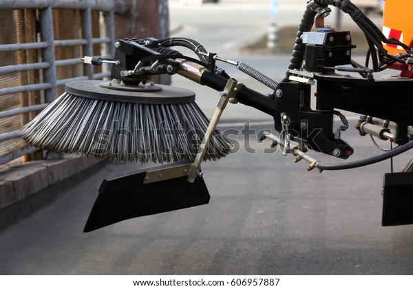 Part of municipal car for cleaning roads and\
sidewalks, closeup