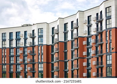 Part of new modern residential apartment building exterior. Detail of new house and home complex. Fragment urban real estate property and condo architecture. High-rise residential complex Copy space.