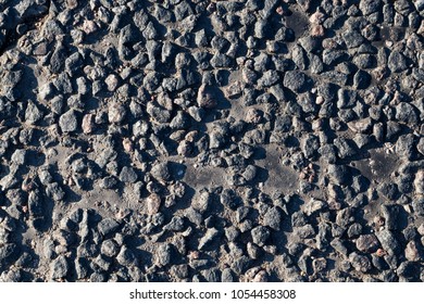 Part Of An Old Asphalt Road, Built Using Rubble, Closeup