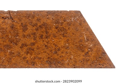 Part of old unknown rusty object isolated on white background. The usual metal detecting find.