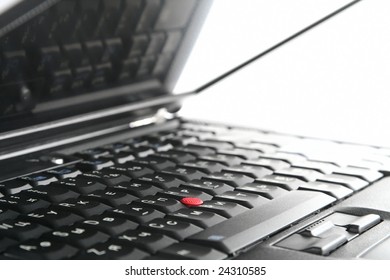 Part of open black notebook