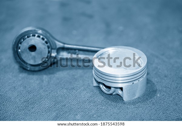 The  part of piston\
and cylinder head  of motorcycle engine. The motorbike parts\
repairing process.