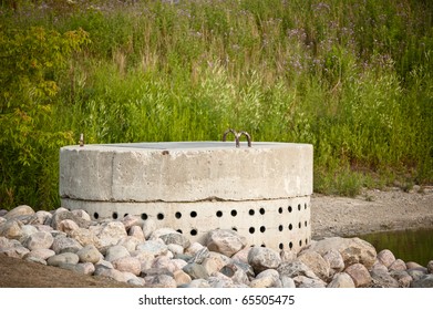 Part Of A Pond Based Stormwater Management System To Prevent Flooding In A Suburban Area.