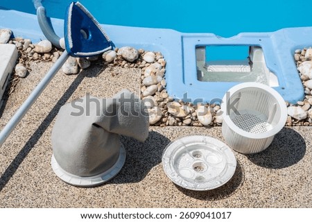 A part of pool skimmer filter before changing. Pool skimmers are filters that capture floating debris before it can sink to the bottom of the pool.