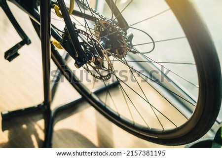 Part of road Bike brake disc in close up. Bicycle shop maintenance technical expertise. details bike front wheel axle disc brake damper. Closeup part of brake disc front wheel mountain bike.