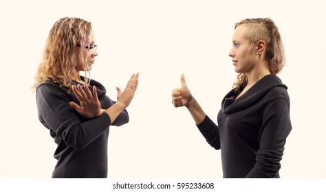 Part Of Series. Self Talk Concept. Young Woman Talking To Herself, Showing Gestures. Double Portrait From Two Different Side Views.