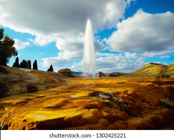 Part of thousands of natural hot springs in the area, the world's largest captive geyser in Soda Springs, Idaho goes off every hour shooting warm water high into the air.