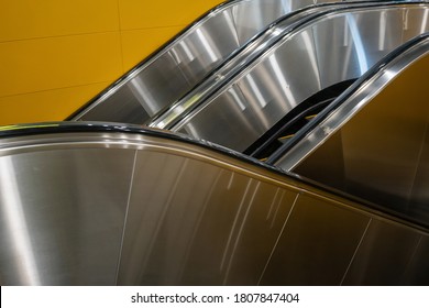 part  view of escalator with metal texture.