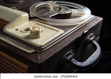 A Part Of Vintage Reel Tape Recorder From 1960s On A Black Background. Selective Focus. 