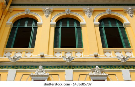 Part Wall With Bas-relief And Open Windows Of Saigon Central Post Office In Ho Chi Minh City, Vietnam. Cultural Heritage Of The French Colonization.