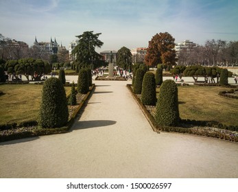 
The Parterre With Gardens In Front Of The Door Of Felipe IV And The Casón Del Buen Retiro In The Retiro Park. Madrid  