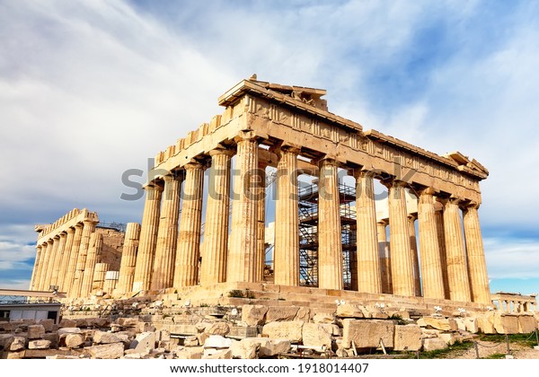 Parthenon temple in sunny day. Acropolis\
in Athens, Greece. The Parthenon is a temple on the Athenian\
Acropolis in Greece, dedicated to the goddess\
Athena.