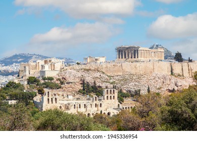 Parthenon view from Filopappou Hill. There can be seen the facade and the southern side of the Parthenon temple, of 5th century BC, on the sacred Akropolis Hill, in Athens, Greece, Europe