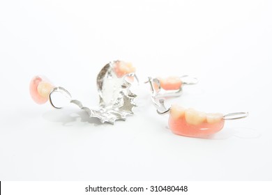 partial dental prosthetics on a white background