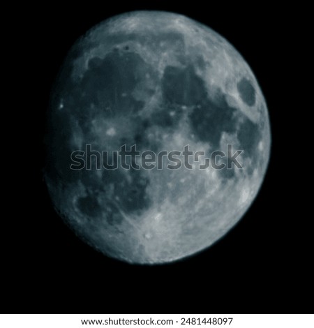 A partial lunar phase when darkness covers a large part of the Moon. The rugged lunar surface, decorated with craters, stands out against a dark background. This image is mysterious