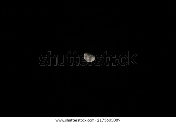 Partial moon on night sky,\
moon phase