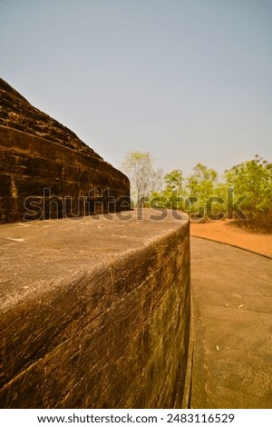 Partial view of ancient Budhhist Stupa built in stone and bricks, Odisha, India.