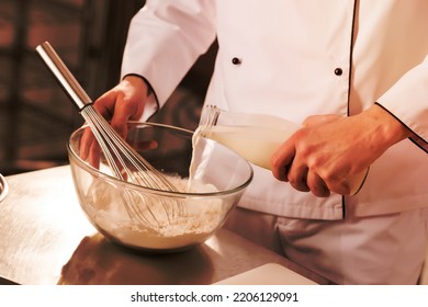 Partial View Confectioner Adding Milk